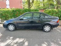 Używany Ford Focus 101 KM (74 kW) 1999 Czarny Sedan/Limuzyna