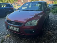 Używany Ford Focus 101 KM (74 kW) 2007 Czerwony Sedan/Limuzyna