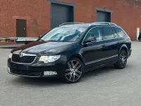 Używany Skoda Superb Elegance 170 KM (125 kW) 2010 Czarny Kombi