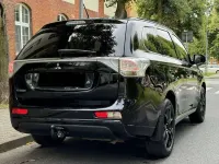 Gebraucht Mitsubishi Outlander P-HEV 121 PS (88 kW) 2014 Schwarz SUV