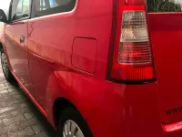 Gebraucht Daihatsu Cuore 54 PS (39 kW) 2004 Rot Kleinwagen
