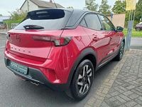 Gebraucht Opel Mokka 131 PS (96 kW) 2024 Rubin rot / dach schwarz SUV