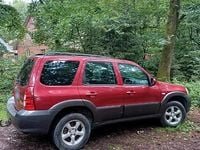 Second-hand Mazda Tribute 150 CP (110 kW) 2006 Roșu SUV