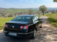 Second-hand VW Passat 160 CP (117 kW) 2009 Negru Berlinǎ