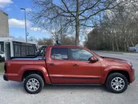 Second-hand VW Amarok 179 CP (131 kW) 2013 Portocaliu Pickup