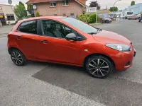 Gebraucht Mazda 2 Active 75 PS (55 kW) 2010 Orange Kleinwagen