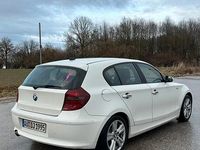 Gebraucht BMW 116 122 PS (89 kW) 2009 Weiß Kleinwagen