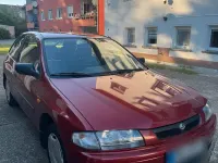 Gebraucht Mazda 323 88 PS (64 kW) 1997 Rot Kleinwagen