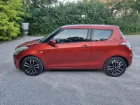 Usado Suzuki Swift 94 CV (69 kW) 2011 Rojo Utilitario