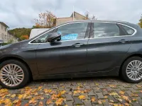 Gebraucht BMW 218 Active Tourer Luxury Line 150 PS (110 kW) 2015 Grau Van / Kleinbus