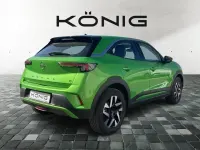 Gebraucht Opel Mokka Elegance 100 kW (136 PS) 2023 Ikone grün (metallic) SUV