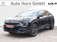 Gebraucht Citroën e-C4 Shine 100 kW (136 PS) 2024 Perla nera schwarz metallic Limousine