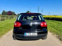 Second-hand VW Golf V 80 CP (58 kW) 2007 Negru Berlinǎ
