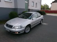 Second-hand Opel Omega 144 CP (105 kW) 2001 Argintiu Berlinǎ
