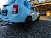 Second-hand Dacia Duster 105 CP (77 kW) 2011 Alb SUV