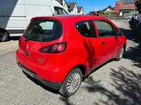 Gebraucht Mitsubishi Colt Basis 75 PS (55 kW) 2009 Rot Kleinwagen