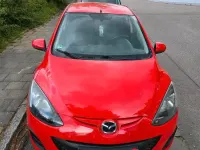 Gebraucht Mazda 2 75 PS (55 kW) 2011 Rot Kleinwagen