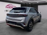 Gebraucht Opel Mokka-e Elegance 100 kW (136 PS) 2021 Kontrast grau/quarz silber SUV