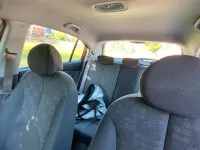Używany Kia Rio 94 KM (69 kW) 2009 Czerwony Hatchback