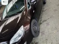 Używany Opel Astra 140 KM (102 kW) 2012 Brązowy Sedan/Limuzyna