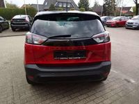Gebraucht Opel Crossland Elegance 110 PS (80 kW) 2023 Lackierung peperoncino red/met SUV