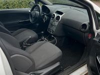 Gebraucht Opel Corsa 75 PS (55 kW) 2013 Weiß Kleinwagen