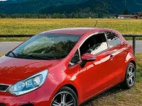 Używany Kia Rio 90 KM (66 kW) 2014 Czerwony Hatchback