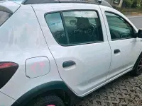 Gebraucht Dacia Sandero Expression 90 PS (66 kW) 2013 Weiß Kleinwagen