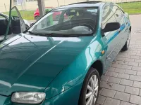 Second-hand Mazda 323F 88 CP (64 kW) 1995 Verde Berlinǎ