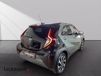 Gebraucht Toyota Aygo X Basis 72 PS (52 kW) 2023 Cardamon green metallic/ night sky black SUV