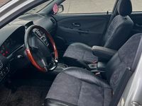 Gebraucht Mitsubishi Carisma 90 PS (66 kW) 2000 Silber Limousine