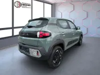 Gebraucht Dacia Spring Extreme 47 kW (65 PS) 2025 Olivgrün Kleinwagen