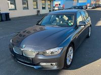 Gebraucht BMW 320 163 PS (119 kW) 2014 Grau Kombi