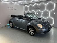 Gebraucht VW New Beetle Cabriolet 102 PS (75 kW) 2010 Grau Cabrio