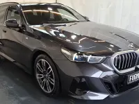 Gebraucht BMW 520 M Sport 197 PS (144 kW) 2024 Grau Kombi