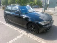 Gebraucht BMW 116 122 PS (89 kW) 2010 Schwarz Kleinwagen