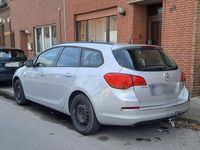 Używany Opel Astra 110 KM (80 kW) 2013 Srebrny Kombi