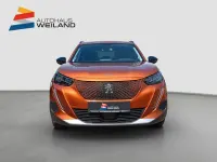 Gebraucht Peugeot e-2008 Allure 100 kW (136 PS) 2022 Lackierung orange fusion/typ aussenverkleidung metalliclackierung SUV