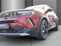 Gebraucht Opel Mokka-e Ultimate 100 kW (136 PS) 2023 Power rot/kosmos rot SUV