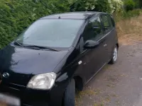 Gebraucht Daihatsu Cuore 58 PS (42 kW) 2006 Schwarz Kleinwagen