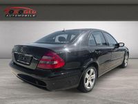 Second-hand Mercedes E200 122 CP (89 kW) 2005 Negru Berlinǎ
