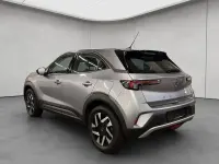 Gebraucht Opel Mokka-e Elegance 100 kW (136 PS) 2023 Kontrast grau metallic SUV