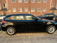 Gebraucht BMW 116 122 PS (89 kW) 2010 Schwarz Kleinwagen