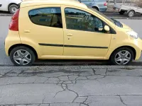 Gebraucht Peugeot 107 69 PS (50 kW) 2012 Gelb Kleinwagen