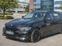 Gebraucht BMW 320e 190 PS (139 kW) 2021 Schwarz Kombi