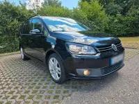 Gebraucht VW Touran 105 PS (77 kW) 2011 Schwarz Van / Kleinbus