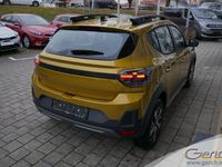 Neu Dacia Sandero Expression 110 PS (80 kW) 2026 Amber yellow Limousine