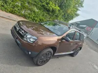 Używany Dacia Duster Lauréate 125 KM (91 kW) 2014 Żółty SUV