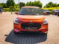 Gebraucht Suzuki Swift Comfort+ 83 PS (61 kW) 2024 Flame orange pearl metallic Kleinwagen