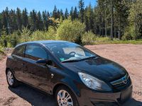 Używany Opel Corsa 69 KM (50 kW) 2010 Czarny Hatchback